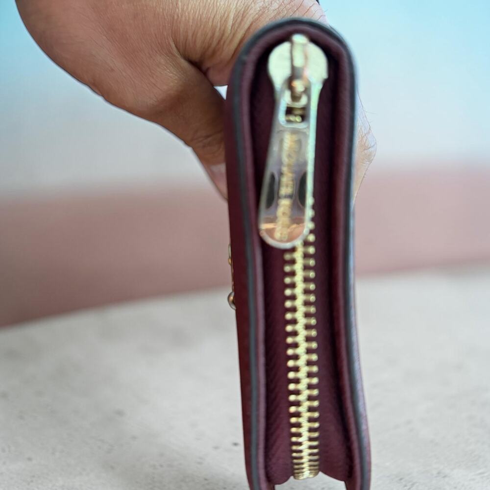 Michael Kors Hamilton Large Zip-Around Wallet in a wine/burgundy color - Picture 8 of 8